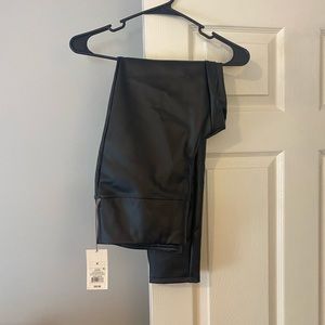 Black faux leather leggings. Size Medium. New with tags!